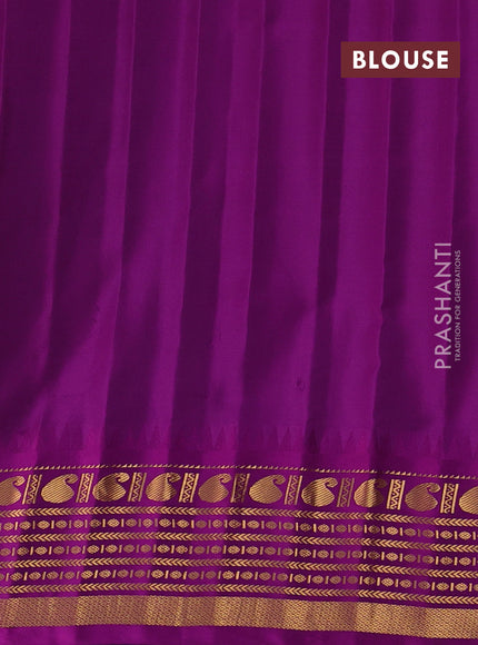 Pure gadwal silk saree teal green and purple with zari woven buttas and temple design zari woven border