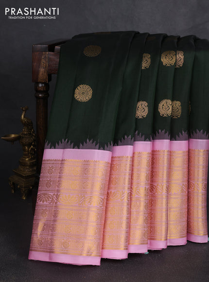 Pure gadwal silk saree bottle green and light pink with zari woven buttas and temple design zari woven border