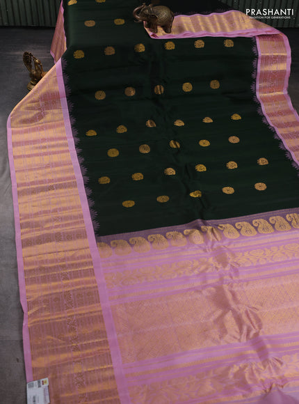 Pure gadwal silk saree bottle green and light pink with zari woven buttas and temple design zari woven border