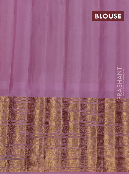 Pure gadwal silk saree bottle green and light pink with zari woven buttas and temple design zari woven border