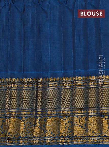 Pure gadwal silk saree grey shade and cs blue with allover zari woven brocade weaves and long zari woven border