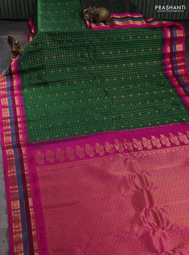 Pure gadwal silk saree green and magenta pink with allover zari checks & buttas and temple design zari woven border