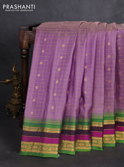 Pure gadwal silk saree mild lavender and green with allover zari checks & buttas and temple design zari woven border