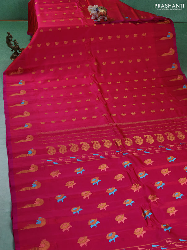 Pure gadwal silk saree dual shade of pinkish oarnge and pink with allover zari woven buttas and peacock zari woven butta border