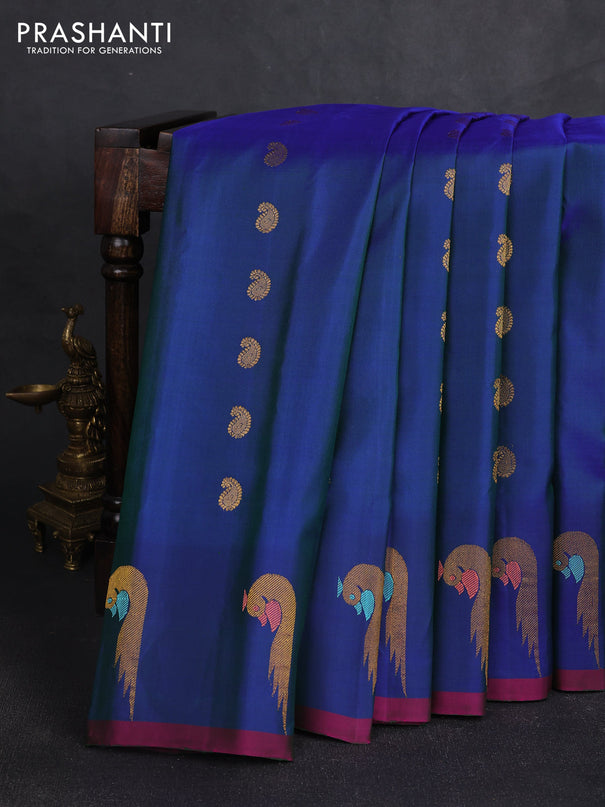 Pure gadwal silk saree dual shade of blue with allover zari woven buttas and peacock zari woven butta border