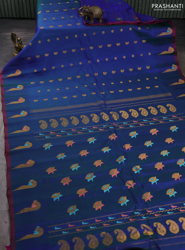 Pure gadwal silk saree dual shade of blue with allover zari woven buttas and peacock zari woven butta border