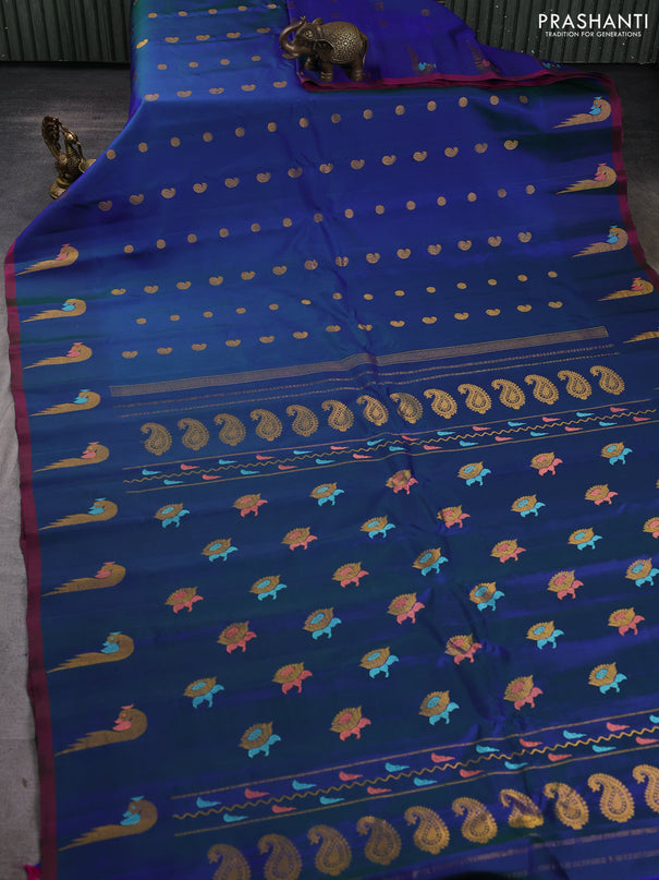 Pure gadwal silk saree dual shade of blue with allover zari woven buttas and peacock zari woven butta border