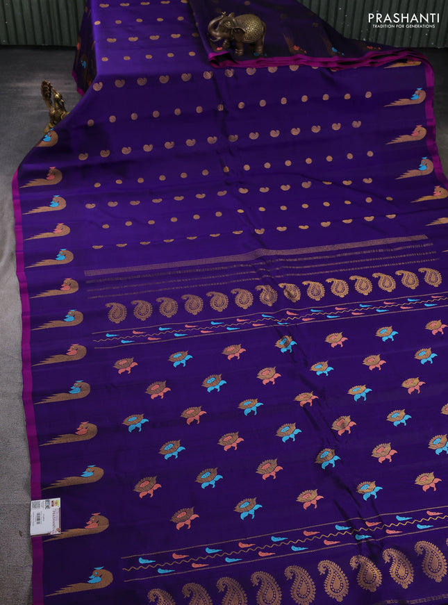 Pure gadwal silk saree blue with allover zari woven buttas and peacock zari woven butta border