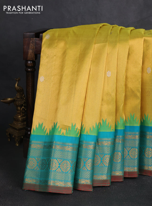 Pure gadwal silk saree yellow and teal green with silver & gold zari woven buttas and temple design zari woven border