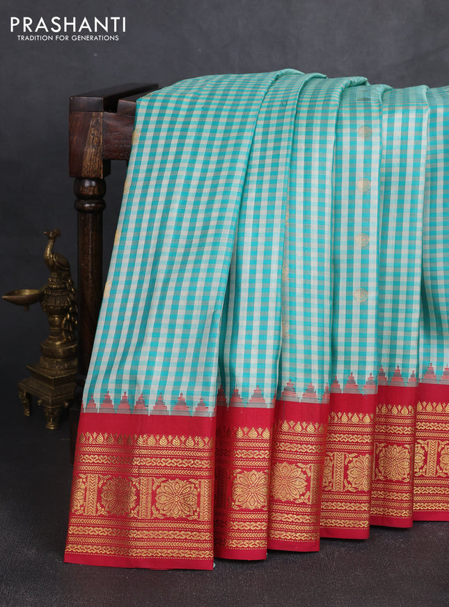 Pure gadwal silk saree off white teal green and reddish pink with allover checks & zari woven buttas and temple design zari woven border