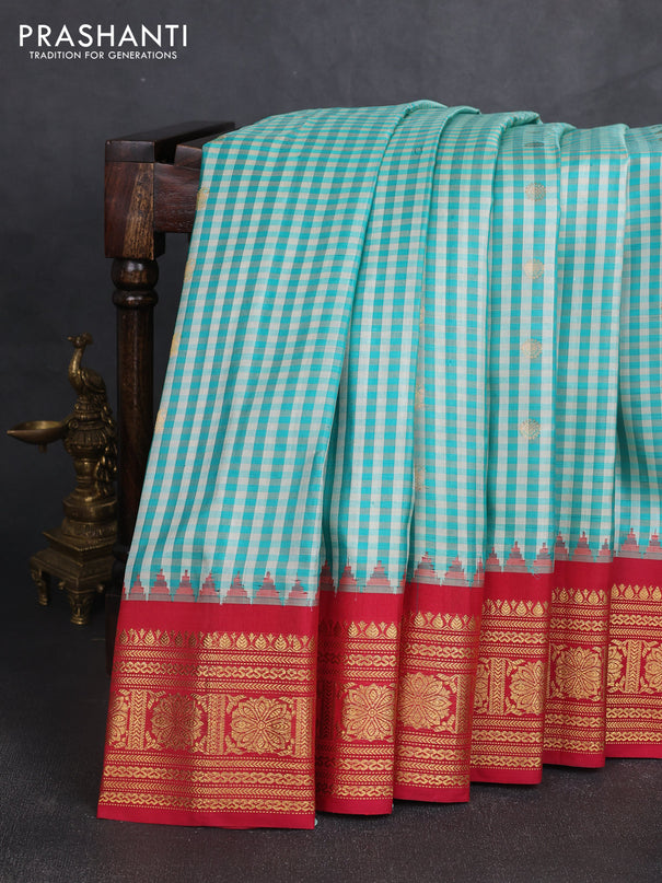 Pure gadwal silk saree off white teal green and reddish pink with allover checks & zari woven buttas and temple design zari woven border
