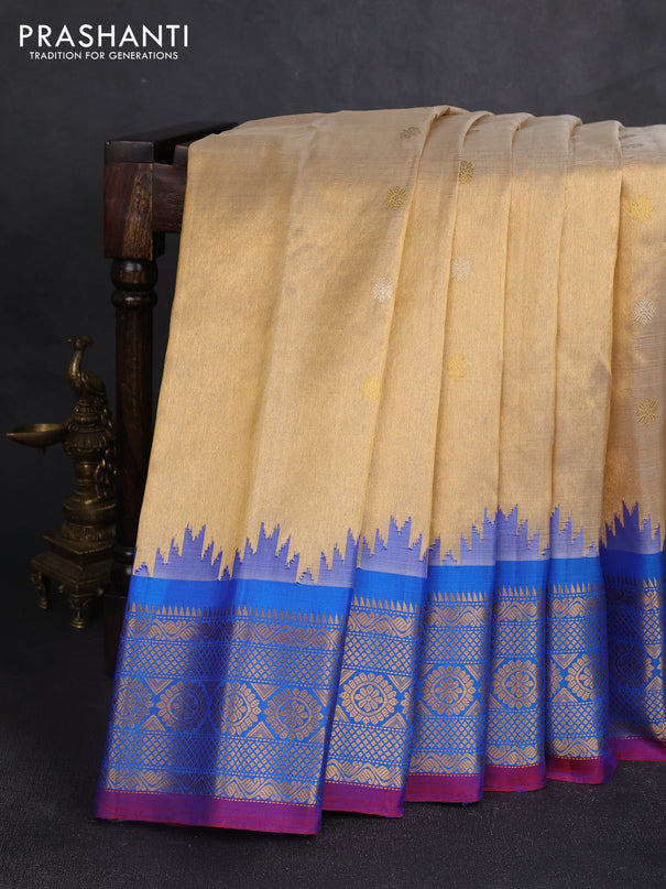Pure gadwal tissue silk saree gold and cs blue with allover silver & gold zari woven buttas and temple design zari woven border