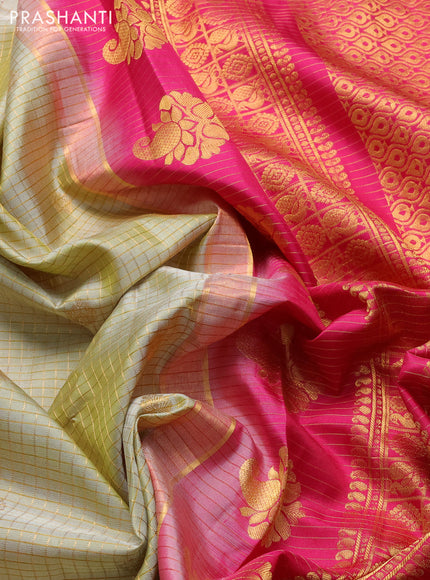 Pure gadwal silk saree elachi green and tomato pink with allover zari checks & buttas and temple design zari woven border