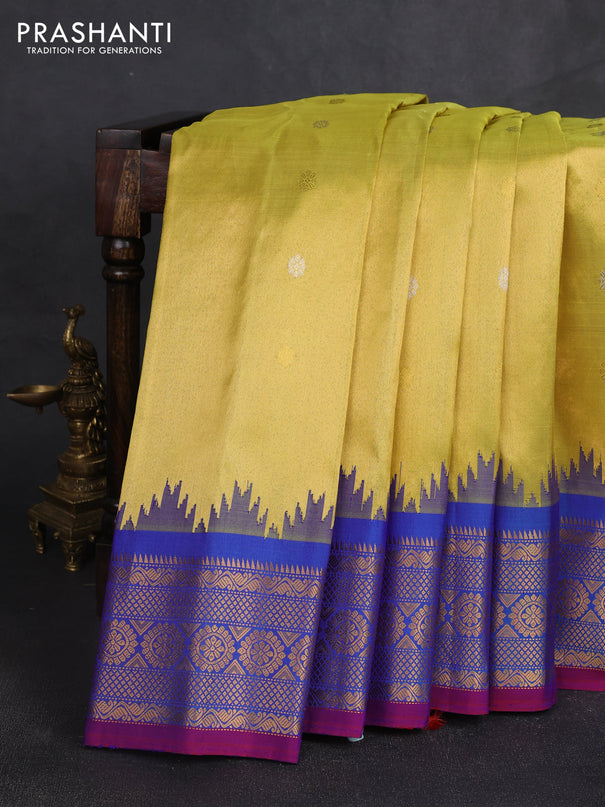 Pure gadwal silk saree lime yellow and blue with allover silver & gold zari woven buttas and temple design zari woven border