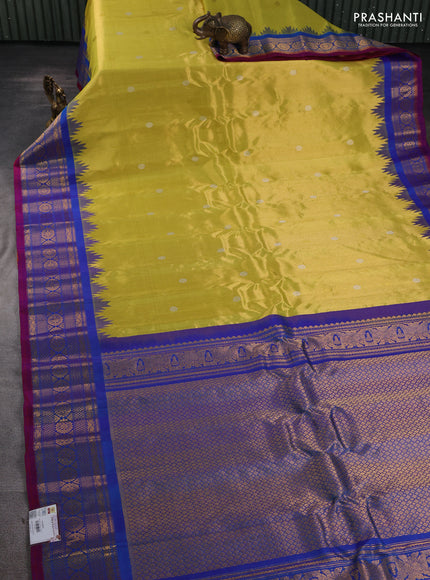 Pure gadwal silk saree lime yellow and blue with allover silver & gold zari woven buttas and temple design zari woven border
