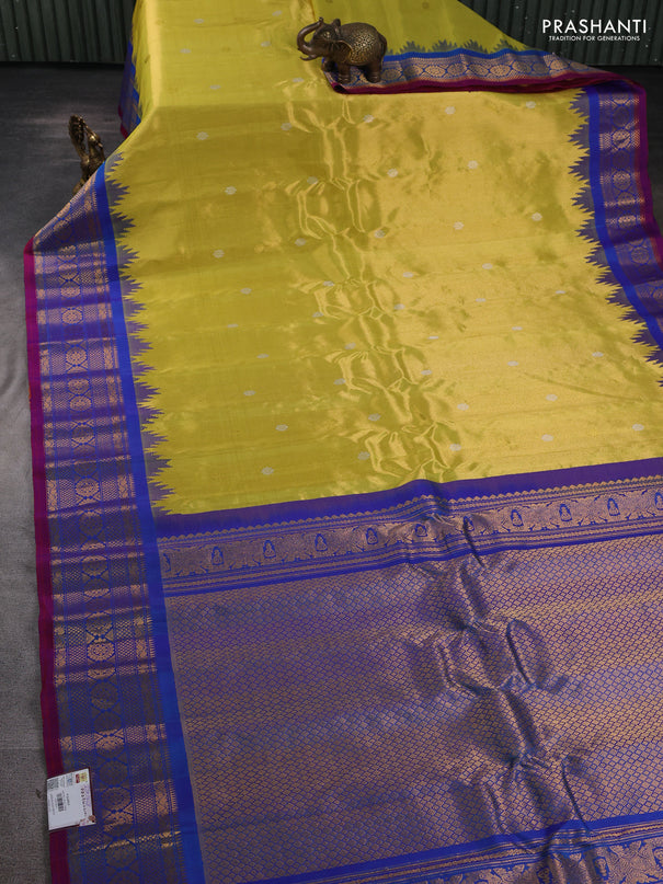 Pure gadwal silk saree lime yellow and blue with allover silver & gold zari woven buttas and temple design zari woven border