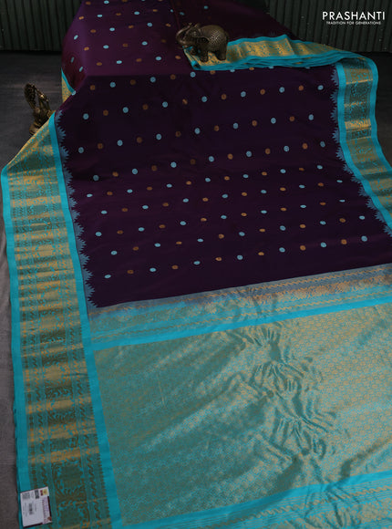 Pure gadwal silk saree wine shade and teal blue with thread & zari woven buttas and temple design zari woven border