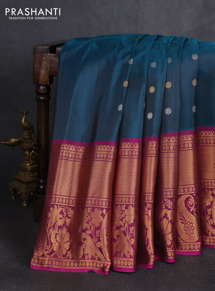 Pure gadwal silk saree peacock green and dark magenta with silver & gold zari woven buttas and long zari woven border