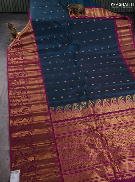 Pure gadwal silk saree peacock green and dark magenta with silver & gold zari woven buttas and long zari woven border
