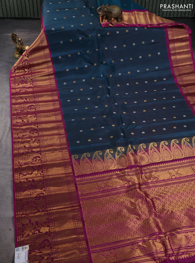 Pure gadwal silk saree peacock green and dark magenta with silver & gold zari woven buttas and long zari woven border