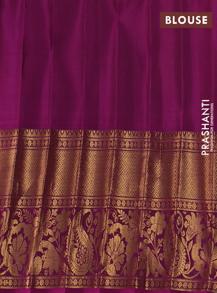 Pure gadwal silk saree peacock green and dark magenta with silver & gold zari woven buttas and long zari woven border