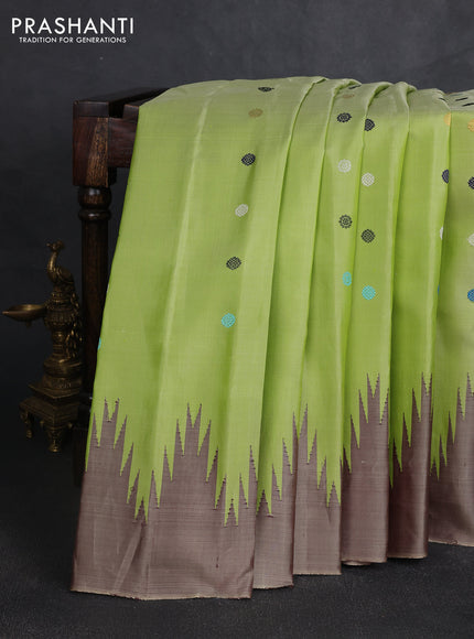 Pure gadwal silk saree pista green and chikku shade with thread & zari woven rudhraksha buttas and temple design border