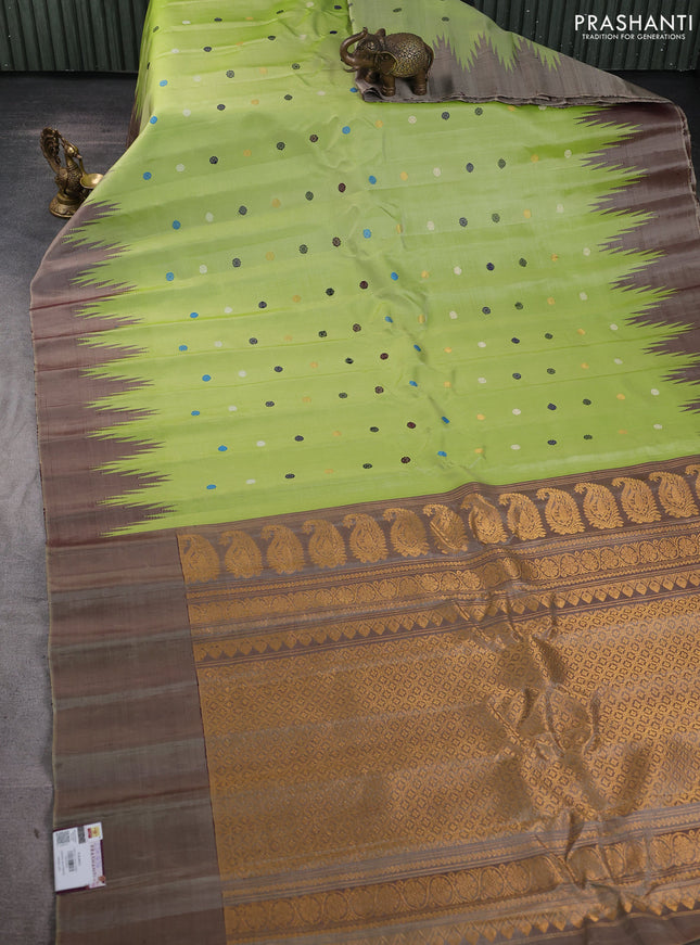 Pure gadwal silk saree pista green and chikku shade with thread & zari woven rudhraksha buttas and temple design border