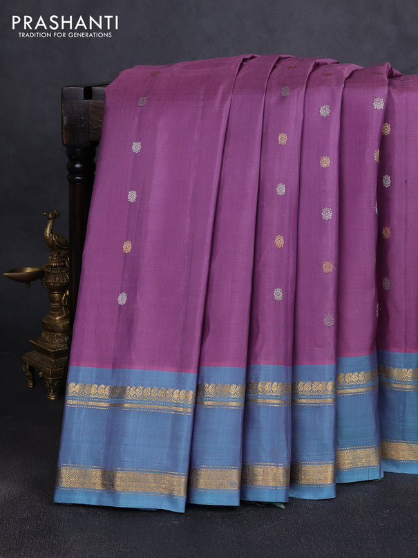 Pure gadwal silk saree pastel purple and greyish blue with silver & gold zari woven buttas and rettapet zari woven border
