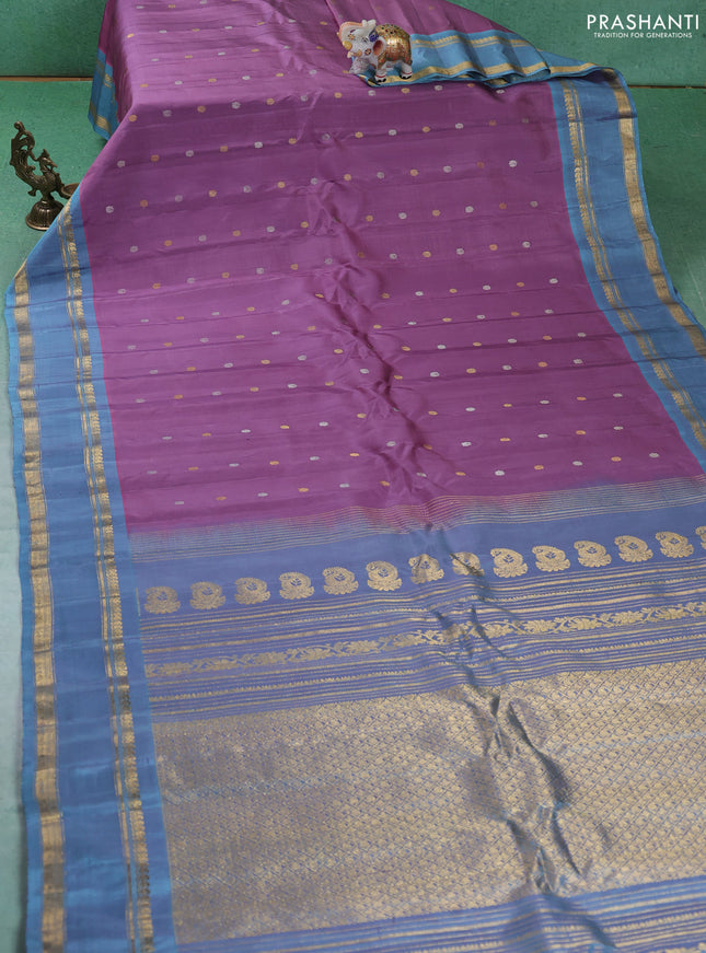 Pure gadwal silk saree pastel purple and greyish blue with silver & gold zari woven buttas and rettapet zari woven border