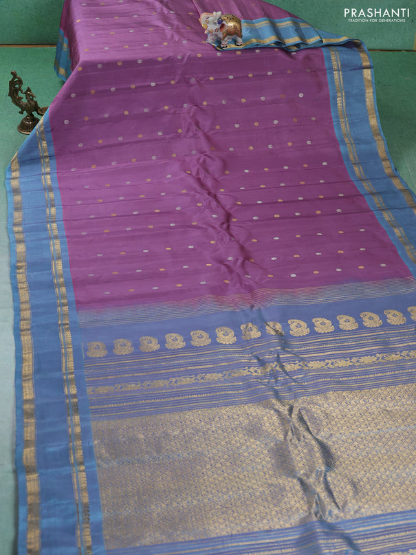 Pure gadwal silk saree pastel purple and greyish blue with silver & gold zari woven buttas and rettapet zari woven border