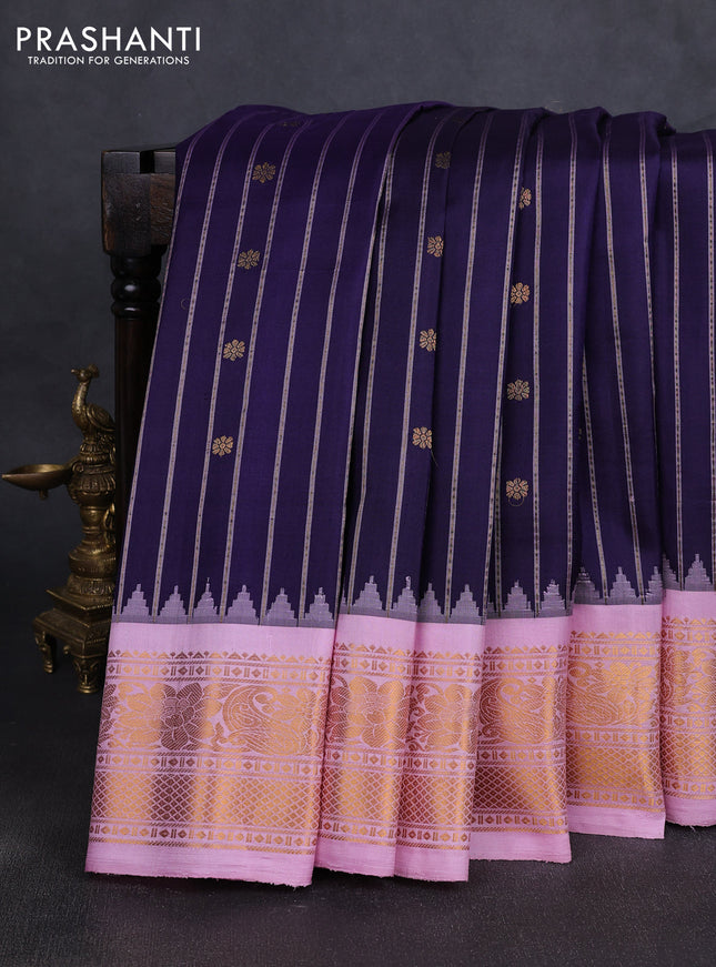 Pure gadwal silk saree navy blue and lotus pink with allover zari stripe & buttas and temple design zari woven border