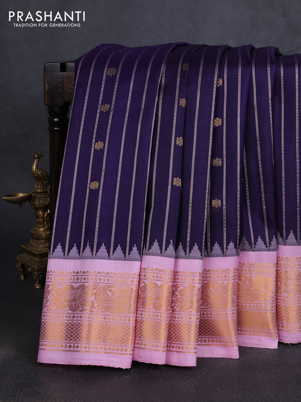 Pure gadwal silk saree navy blue and lotus pink with allover zari stripe & buttas and temple design zari woven border