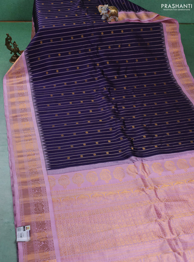 Pure gadwal silk saree navy blue and lotus pink with allover zari stripe & buttas and temple design zari woven border