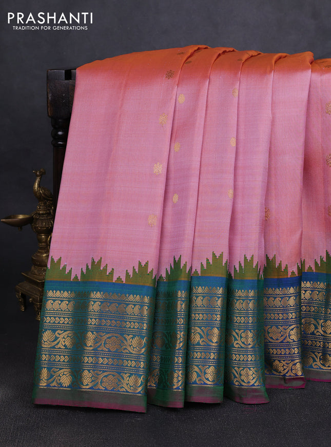 Pure gadwal silk saree mild peach pink and dual shade of bluish green with zari woven buttas and temple design zari woven border