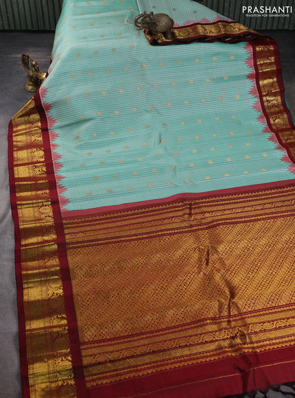 Pure gadwal silk saree teal green shade and maroon with allover checked pattern & zari buttas and zari woven border