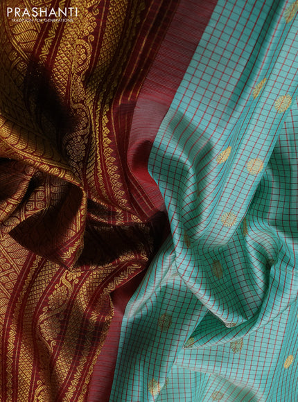 Pure gadwal silk saree teal green shade and maroon with allover checked pattern & zari buttas and zari woven border