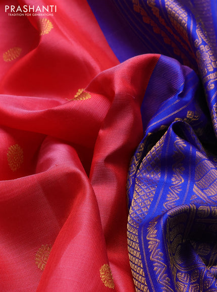 Pure gadwal silk saree tomato pink and blue with allover zari woven buttas and temple design zari woven border