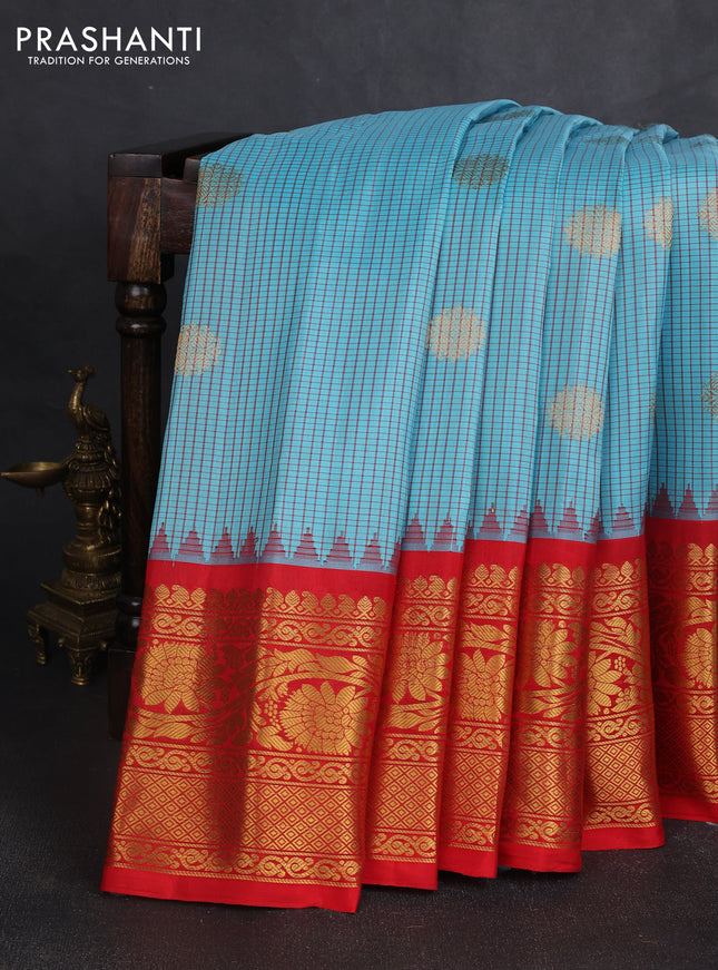 Pure gadwal silk saree cs blue and red with allover thread checks & zari woven buttas and temple design zari woven border