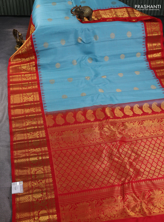 Pure gadwal silk saree cs blue and red with allover thread checks & zari woven buttas and temple design zari woven border