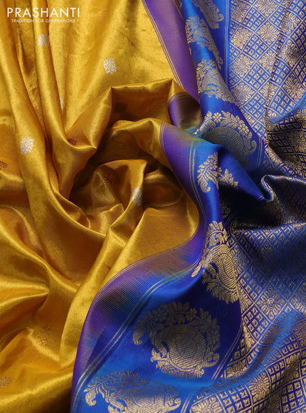 Pure gadwal silk saree mustard yellow and cs blue with allover silver & gold zari woven buttas and temple design zari woven border