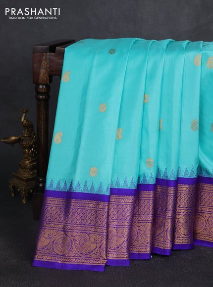 Pure gadwal silk saree teal blue and royal blue with allover paisley zari woven buttas and temple design zari woven border