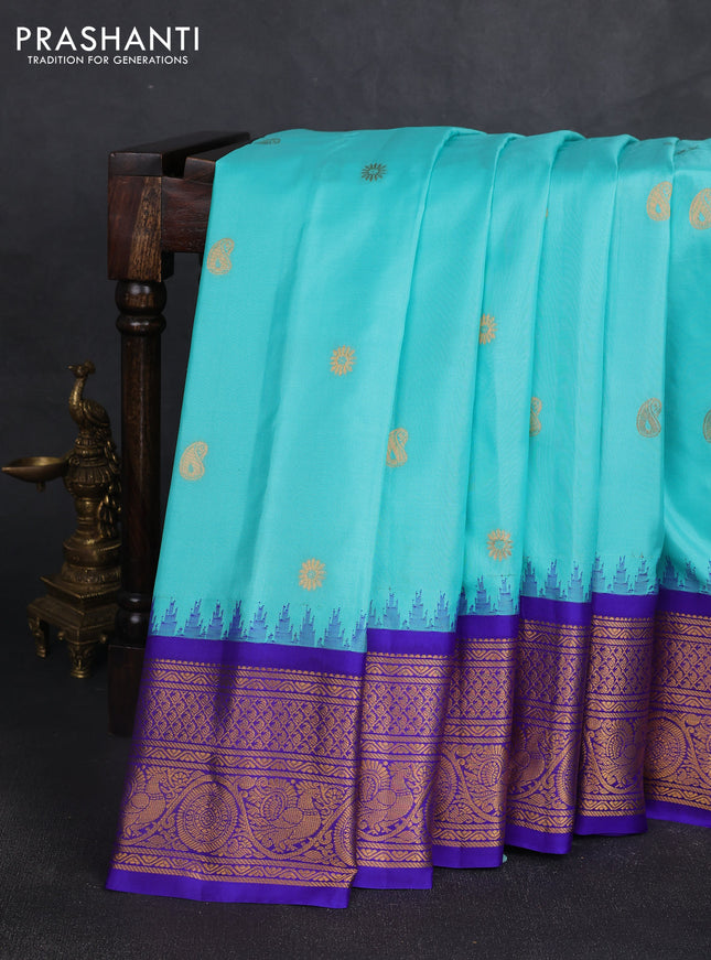 Pure gadwal silk saree teal blue and royal blue with allover paisley zari woven buttas and temple design zari woven border