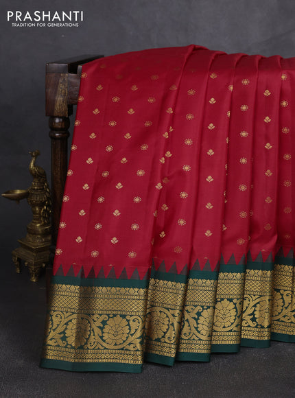 Pure gadwal silk saree maroon and bottle green with allover zari woven buttas and temple design zari woven border