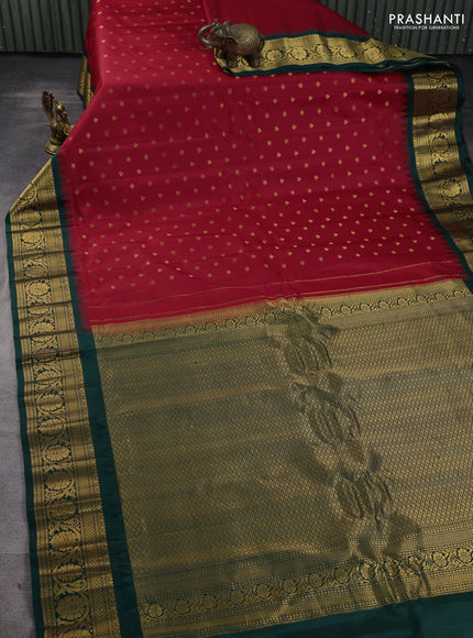 Pure gadwal silk saree maroon and bottle green with allover zari woven buttas and temple design zari woven border