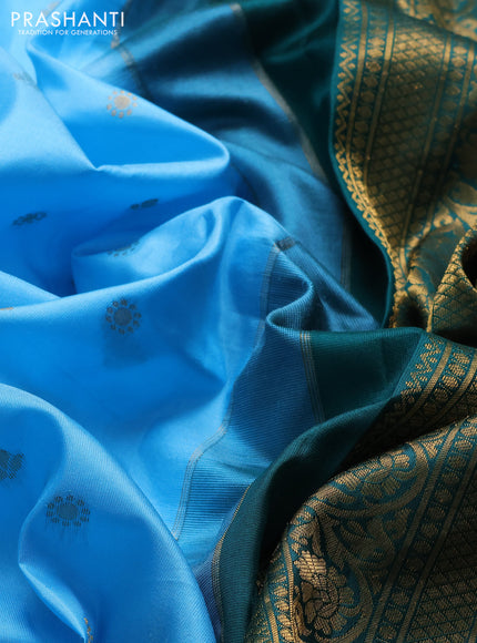 Pure gadwal silk saree light blue and green with allover zari woven buttas and temple design zari woven border