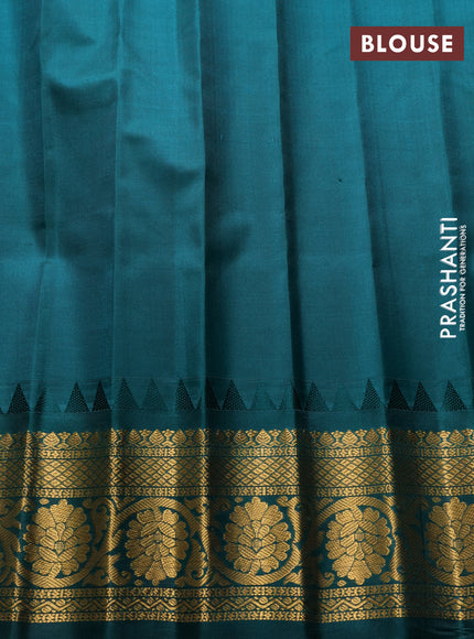 Pure gadwal silk saree light blue and green with allover zari woven buttas and temple design zari woven border
