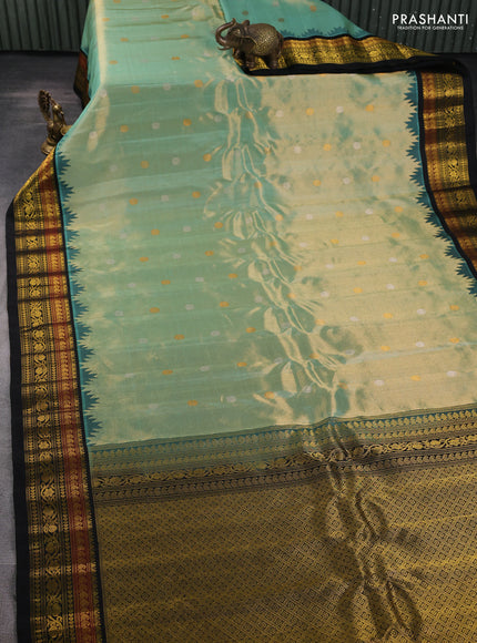 Pure gadwal tissue silk saree pastel green and black with silver & gold zari woven buttas and temple design zari woven border