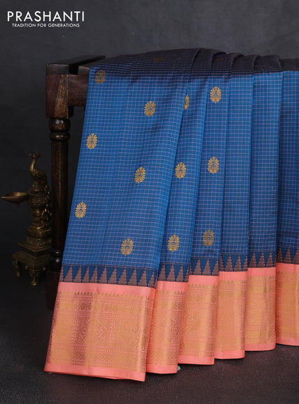 Pure gadwal silk saree peacock blue and peach orange with allover checked pattern & zari buttas and temple design zari woven border