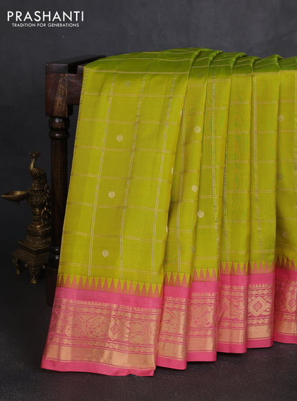 Pure gadwal silk saree lime green and peach pink with allover zari checks & zari woven buttas and temple design zari woven border