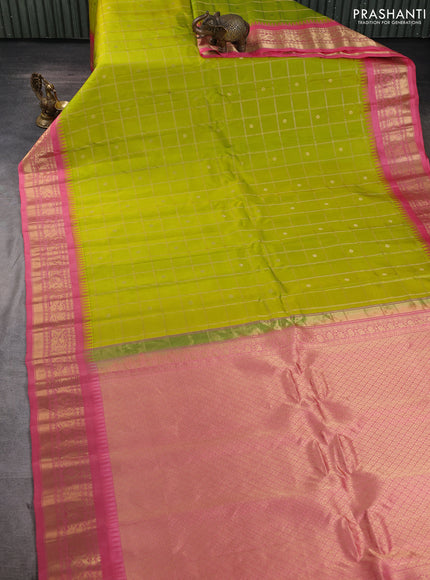 Pure gadwal silk saree lime green and peach pink with allover zari checks & zari woven buttas and temple design zari woven border